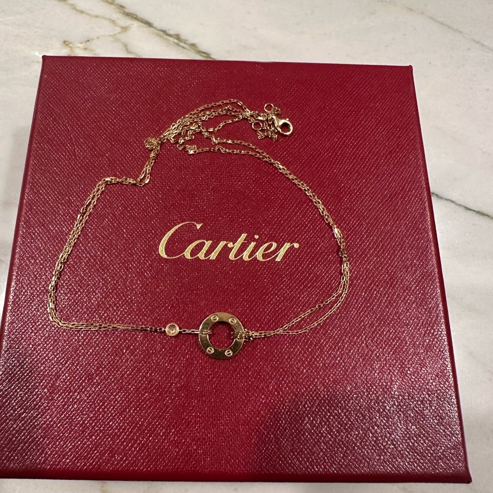 Cartier Gold Necklace with Minimalist Charm Design